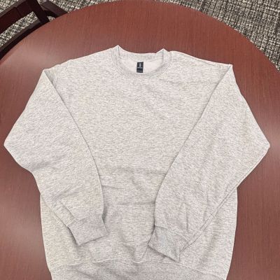 Grey sweatshirt on table